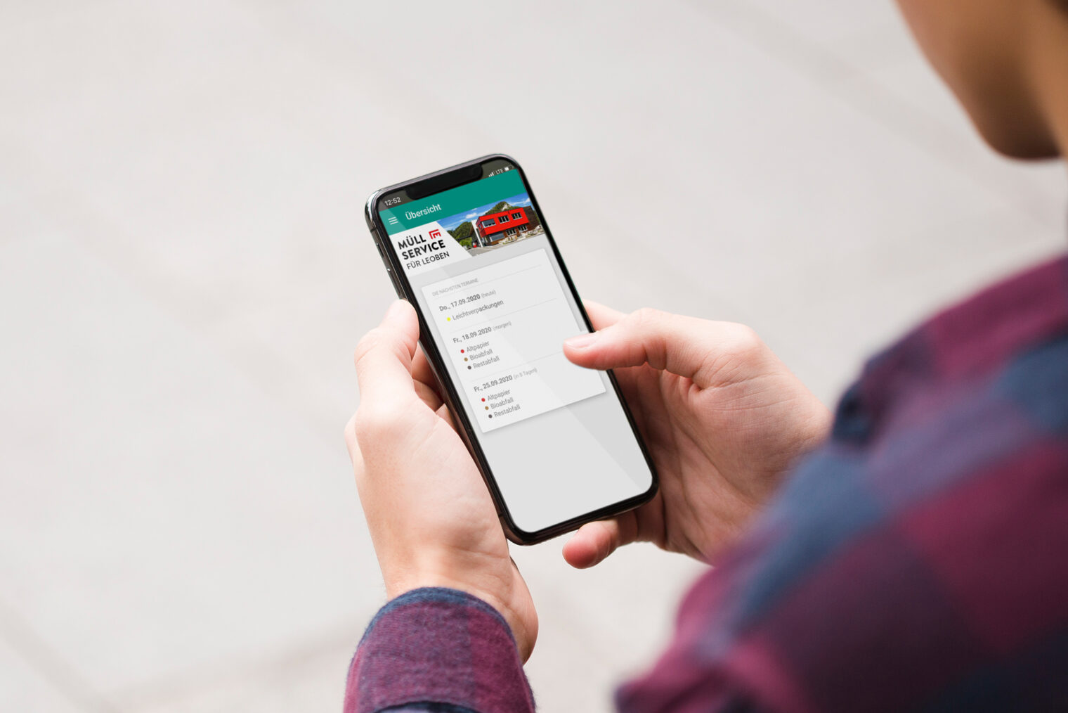 Symbolbild MuellApp am Smartphone-Display